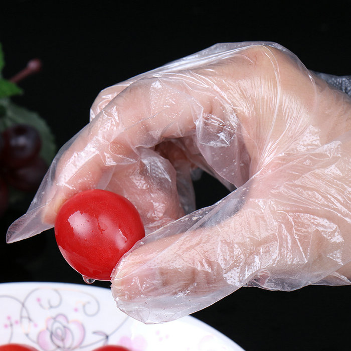 Guante desechable de plástico de grado alimenticio al por mayor ISO 9001 sin polvo